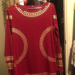 Red long sleeve dress .